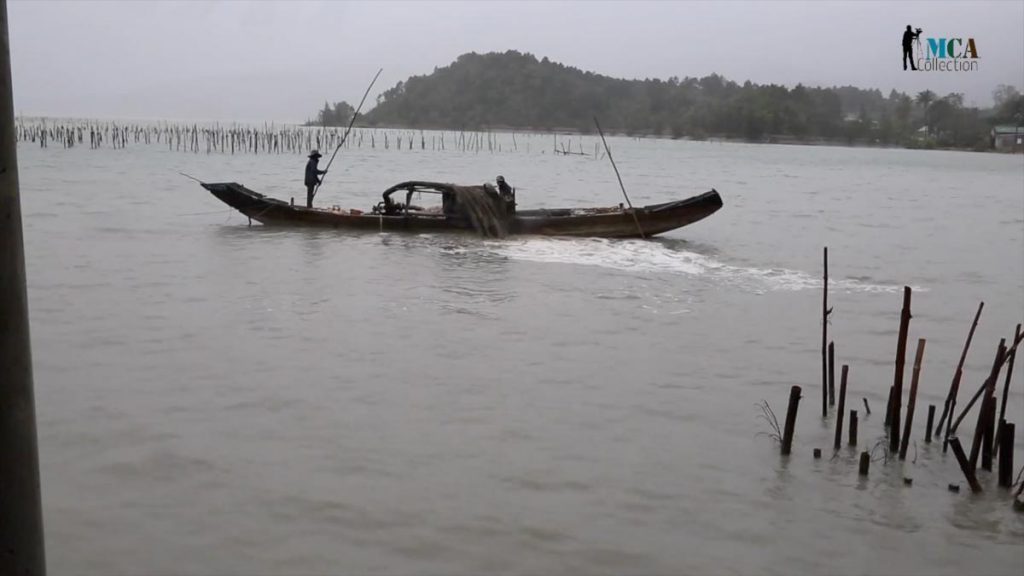 Vietnam, traditional work – mud pumping High-Quality Images & Videos The MCA Collection