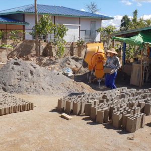 Myanmar, traditional – Preparation of concrete blocks High-Quality Images & Videos The MCA Collection