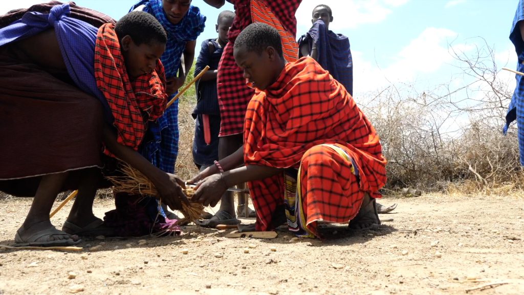 Tanzania, Maasai people lighting a fire (00:05:35) High-Quality Images & Videos The MCA Collection