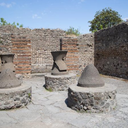 Italy, Pompeii, the Bakery of Numerius Popidius Priscus, with the oven and the stone millstones