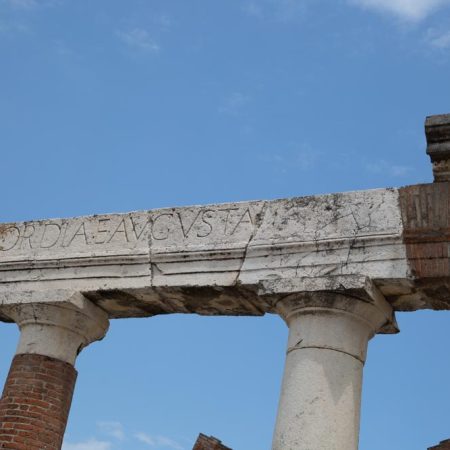 Italy, Pompeii, Roman Forum, Portico with Corinthian columns with inscription Italy, Pompeii, Roman Forum, Portico with Corinthian columns with inscription