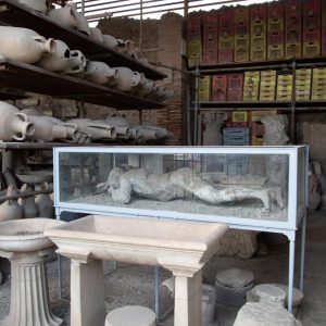 Italy, Pompeii, store-room with various bowls, amphorae, and Plaster casts of victims1 High-Quality Images & Videos The MCA Collection