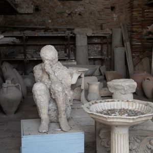 Italy, Pompeii, store-room with various bowls, amphorae, and Plaster casts of victims2 High-Quality Images & Videos The MCA Collection
