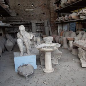 Italy, Pompeii, store-room with various bowls, amphorae, and Plaster casts of victims3 High-Quality Images & Videos The MCA Collection