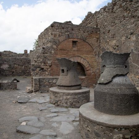 Italy, Pompeii, Bakery of Numerius Popidius  Priscus, with the oven and the stone  millstones