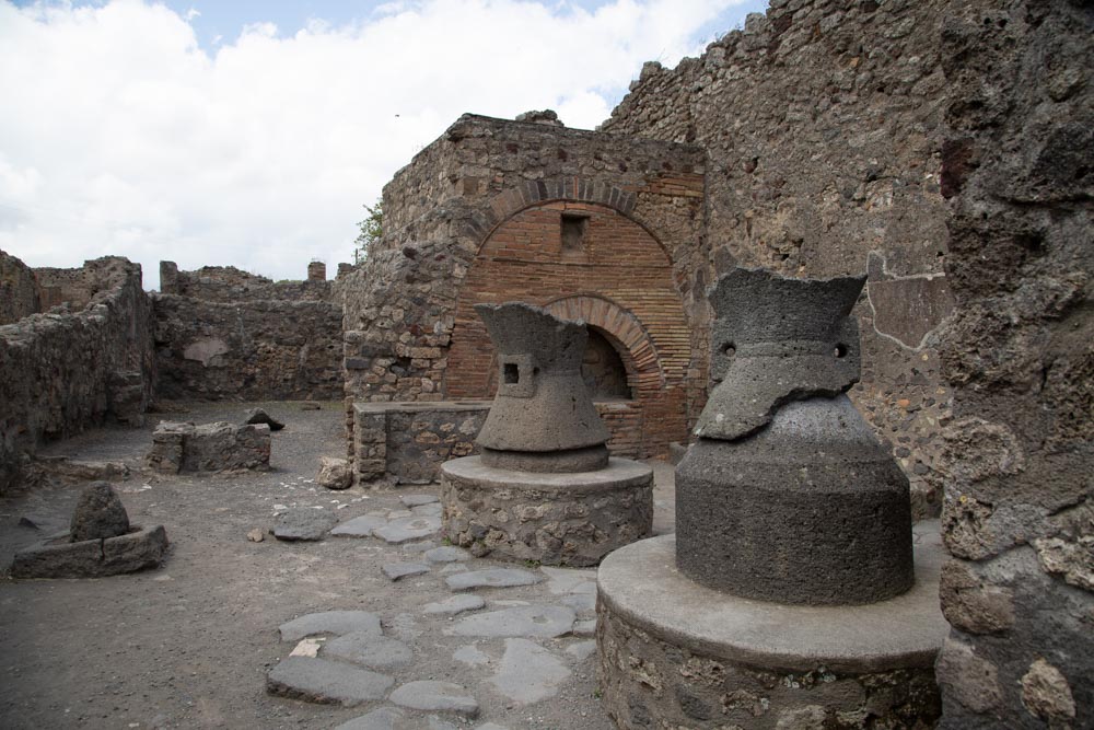 Italy, Pompeii, Bakery of Numerius Popidius  Priscus, with the oven and the stone  millstones High-Quality Images & Videos The MCA Collection