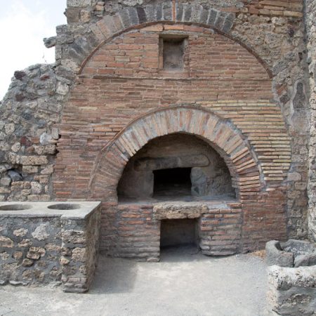Italy, Pompeii, Bakery of Numerius Popidius Priscus, with the oven and the stone  millstones