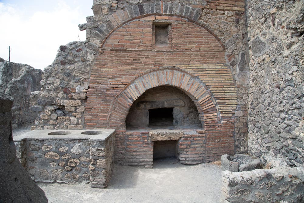 Italy, Pompeii, Bakery of Numerius Popidius Priscus, with the oven and the stone  millstones High-Quality Images & Videos The MCA Collection