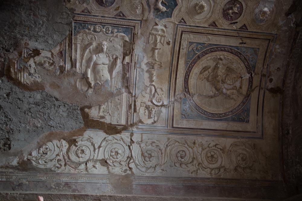 Italy, Pompeii,Forum Baths, view of the Tapidaruim with coloured stucco and shelves separated by telamones12 High-Quality Images & Videos The MCA Collection