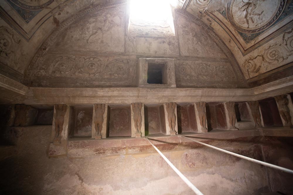 Italy, Pompeii,Forum Baths, view of the Tapidaruim with coloured stucco and shelves separated by telamones13 High-Quality Images & Videos The MCA Collection