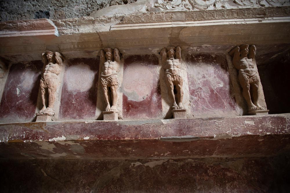 Italy, Pompeii,Forum Baths, view of the Tapidaruim with coloured stucco and shelves separated by telamones17 High-Quality Images & Videos The MCA Collection