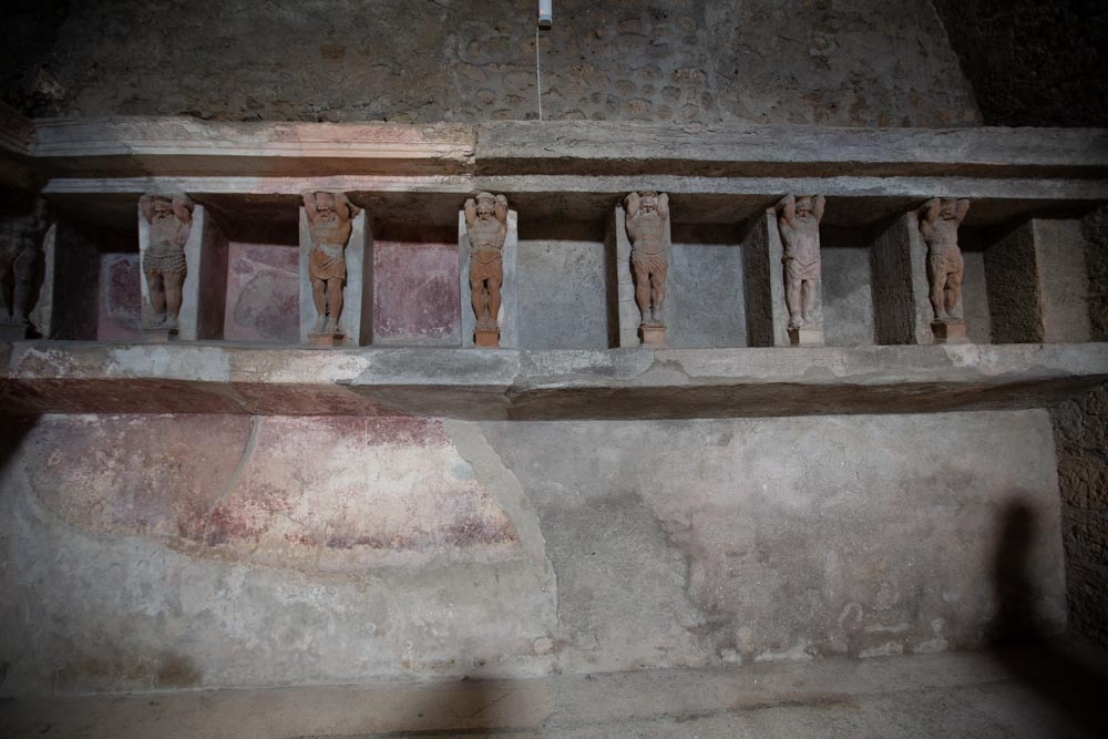 Italy, Pompeii,Forum Baths, view of the Tapidaruim with coloured stucco and shelves separated by telamones19 High-Quality Images & Videos The MCA Collection