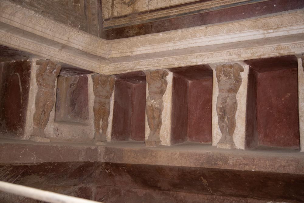 Italy, Pompeii,Forum Baths, view of the Tapidaruim with coloured stucco and shelves separated by telamones2 High-Quality Images & Videos The MCA Collection