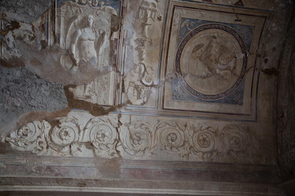 Italy, Pompeii,Forum Baths, view of the Tapidaruim with coloured stucco and shelves separated by telamones3 High-Quality Images & Videos The MCA Collection