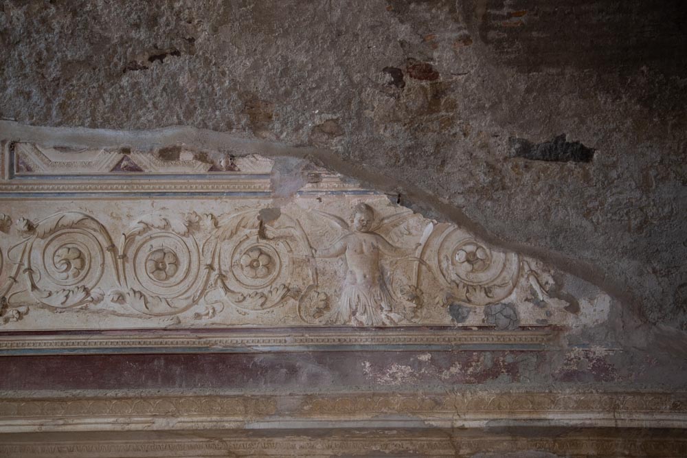 Italy, Pompeii,Forum Baths, view of the Tapidaruim with coloured stucco and shelves separated by telamones6 High-Quality Images & Videos The MCA Collection
